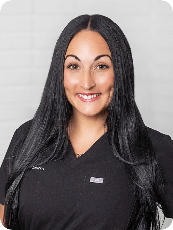 Profile headshot of team member Sierra